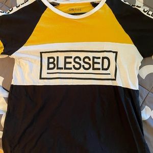Yellow white black blessed shirt
